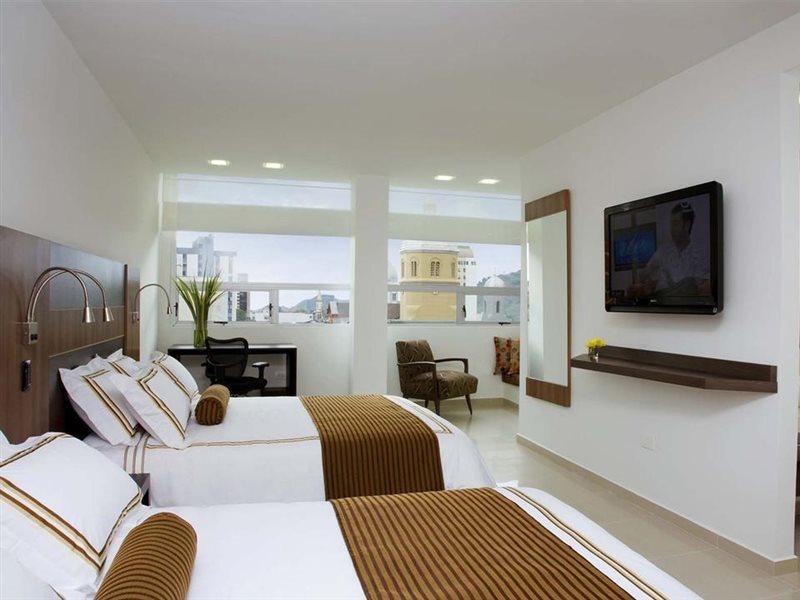 San Simon Hotel Pereira By Soratama Kültér fotó A room at the hotel