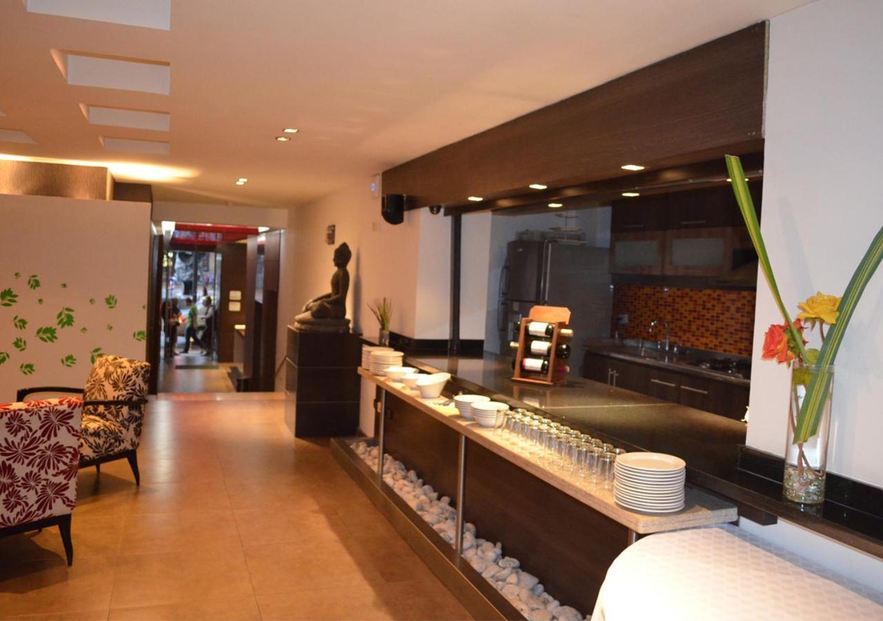 San Simon Hotel Pereira By Soratama Kültér fotó The interior of the restaurant